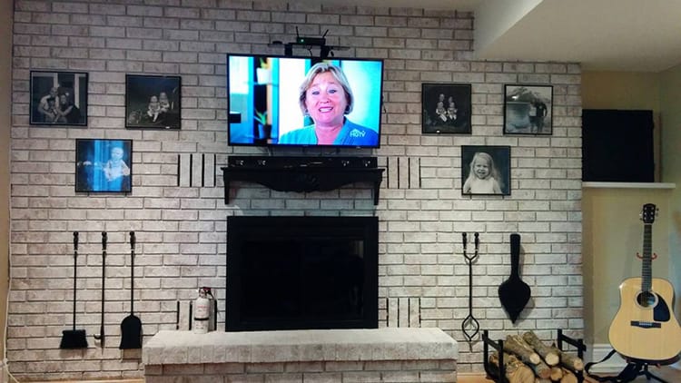 Whitewash a brick fireplace wall